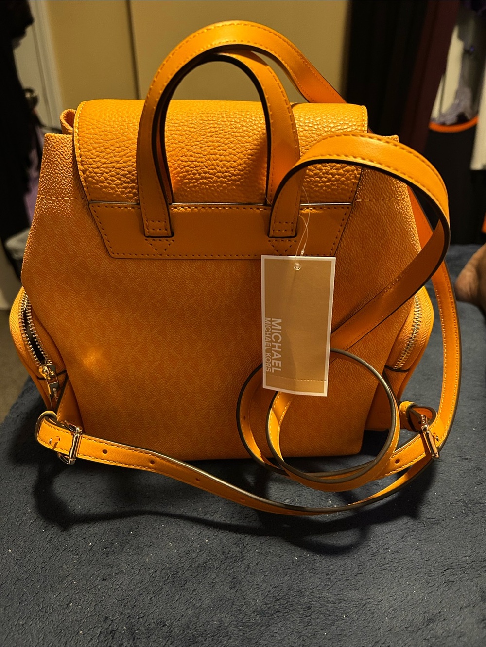 Michael Kors Bright Orange Signature Drawstring Backpack - Picture 2 of 3